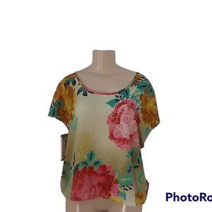 Jennifer Lopez  gold floral crop top with gray back